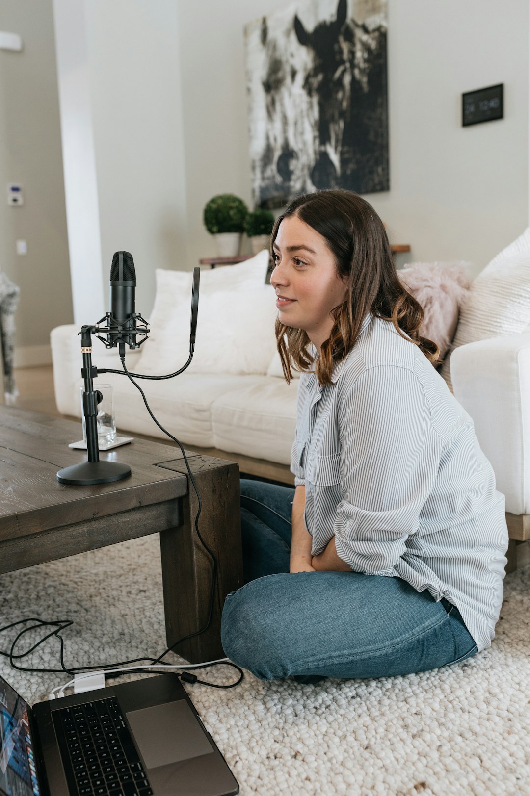 woman recording podcast